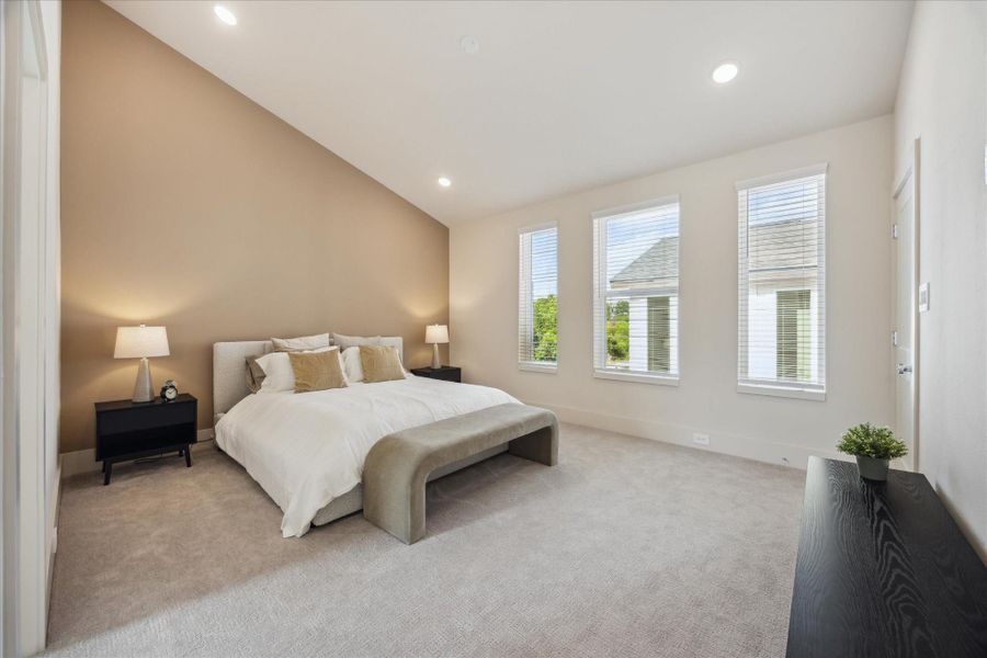 High ceilings and well-placed windows bring in natural light while maintaining privacy.