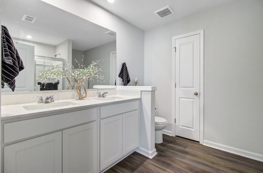 Furnished interior view inside a new home in Sanctuary Cove at Cane Bay, Summerville (Image 45).