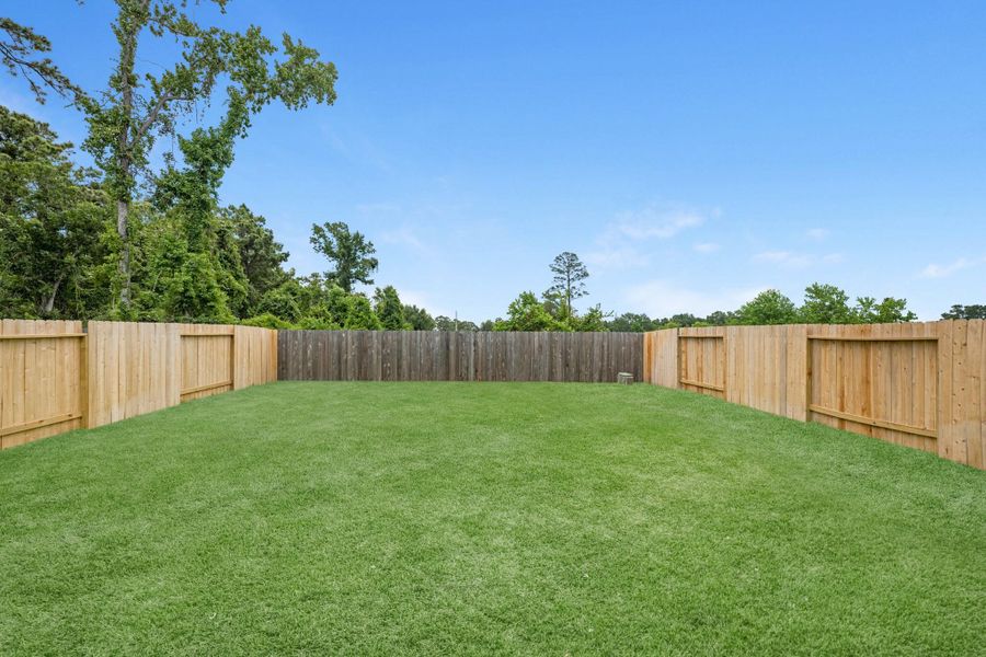 Exterior details and patio area of a home in Cypresswood Landing, Humble (Image 3).