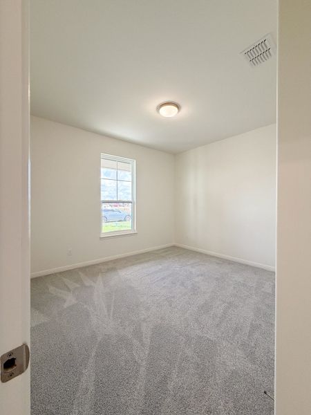 Spacious, unfurnished interior of a new home in TerraVista, Victoria (Image 47).