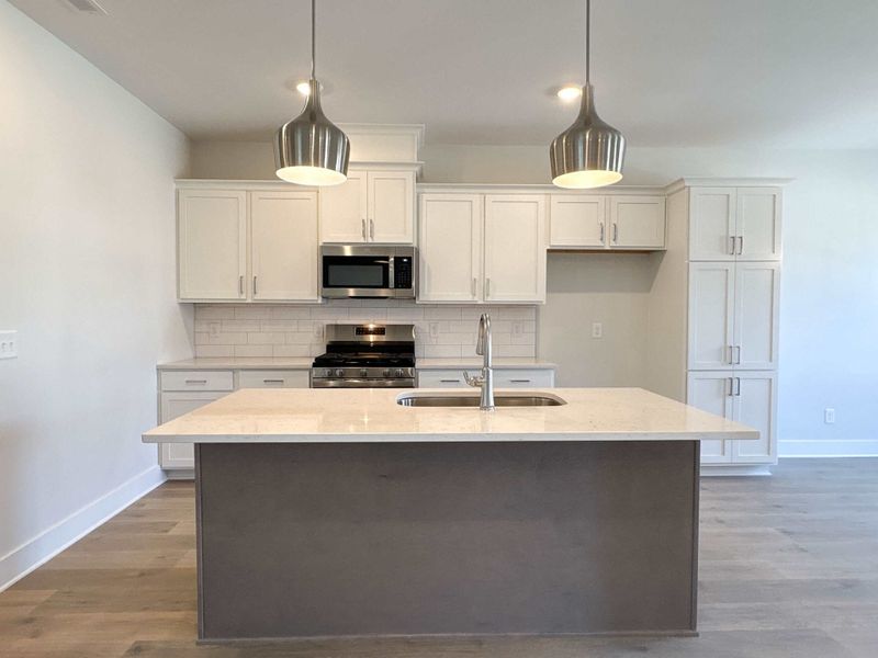 Furnished interior view inside a new home in The Paddock, Gallatin (Image 4).