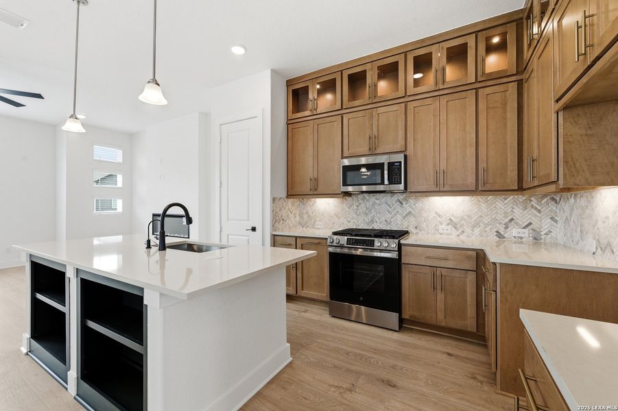 Furnished interior view inside a new home in Centero at Stone Oak, San Antonio (Image 6).