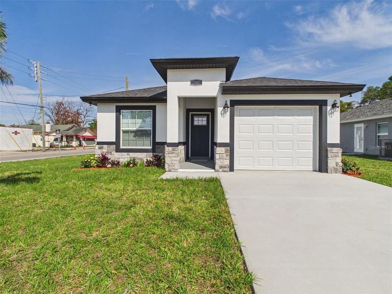 Front exterior of a new home in , Lakeland, FL, highlighting curb appeal (Image 19). Front exterior of a new home in , Lakeland, FL, highlighting curb appeal (Image 19).