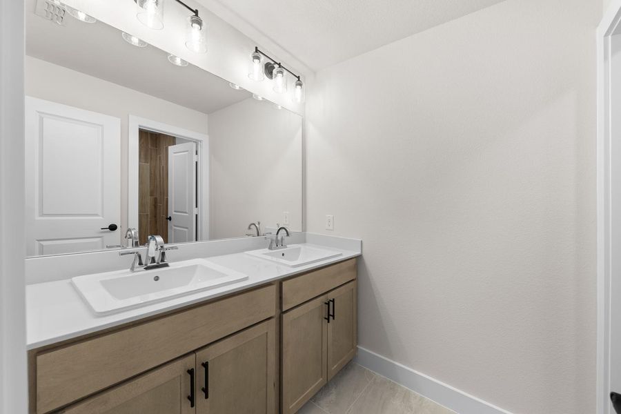 Furnished interior view inside a new home in Inspiration Collection 60 at Painted Tree, McKinney (Image 11). Furnished interior view inside a new home in Inspiration Collection 60 at Painted Tree, McKinney (Image 11).