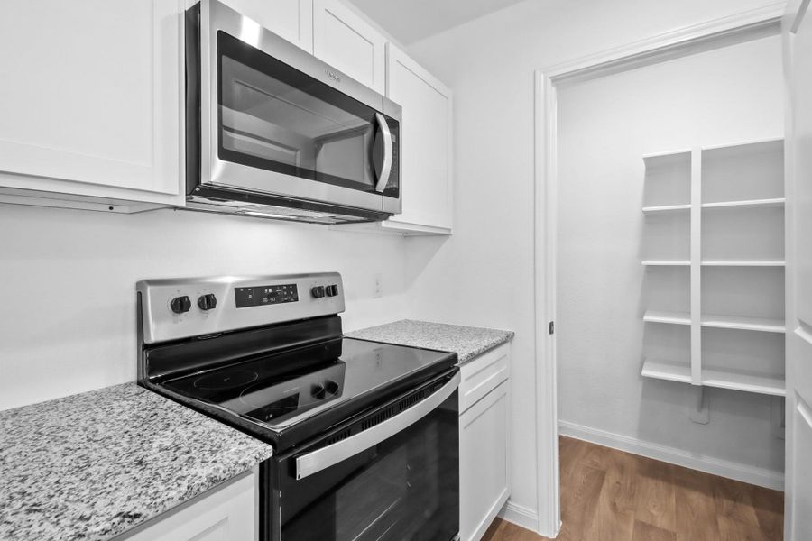 Furnished interior view inside a new home in William Trails, Willis (Image 3). Furnished interior view inside a new home in William Trails, Willis (Image 3).