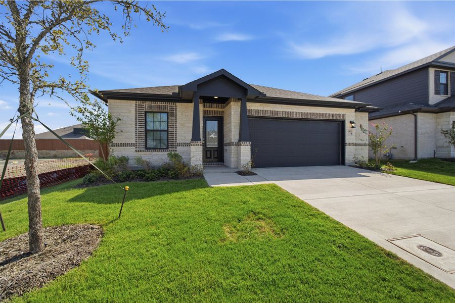 Front exterior of a new home in Heartland, Crandall, TX, highlighting curb appeal (Image 20).