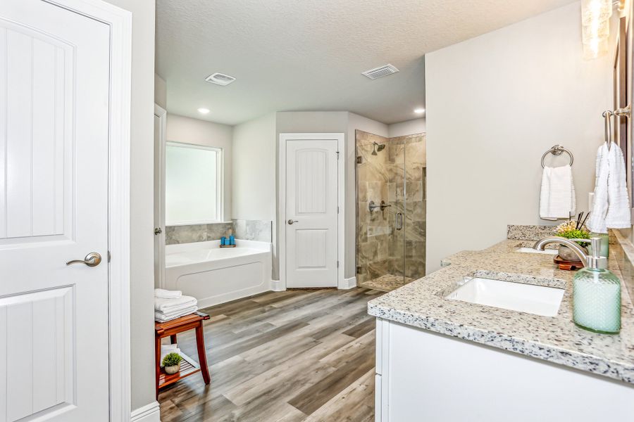 Representative furnished interior of a home built from the The Carlos by Herbst Homes in Doyle Hawkins Landing, Navarre (Image 70).