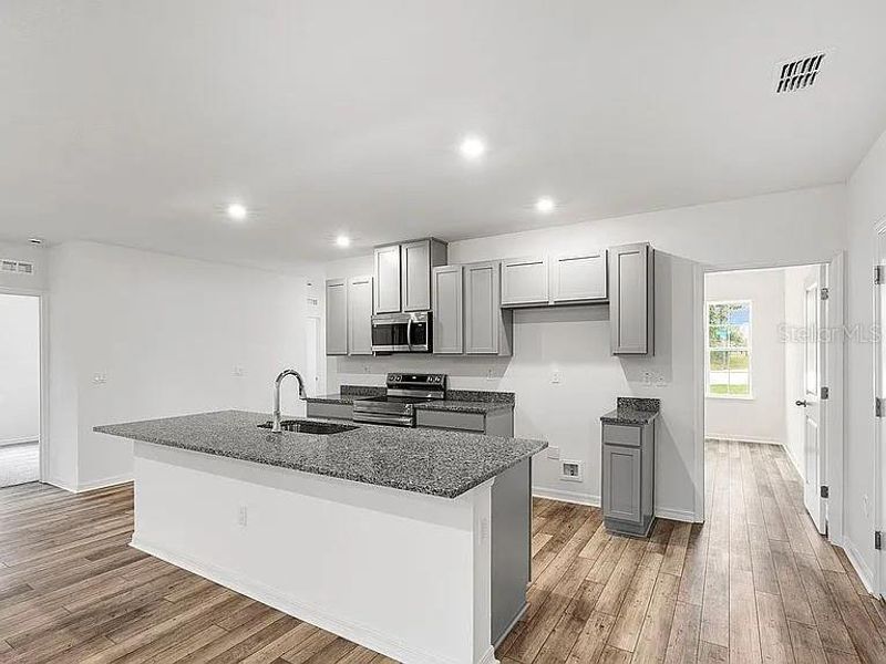 Furnished interior view inside a new home in Royal Highlands, Brooksville (Image 10).