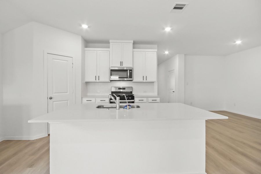 Furnished interior view inside a new home in Harrington Trails at The Canopies, Splendora (Image 3).