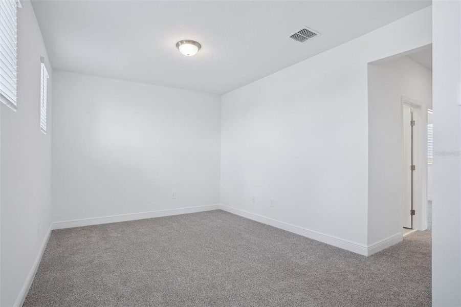 Spacious, unfurnished interior of a new home in Cyrene at Minneola - Villas, Montverde (Image 27). Spacious, unfurnished interior of a new home in Cyrene at Minneola - Villas, Montverde (Image 27).