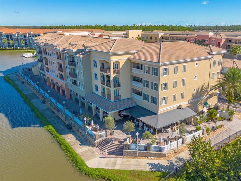 Condo located in New Smyrna Beach, FL showcasing its design and architecture (Image 1).