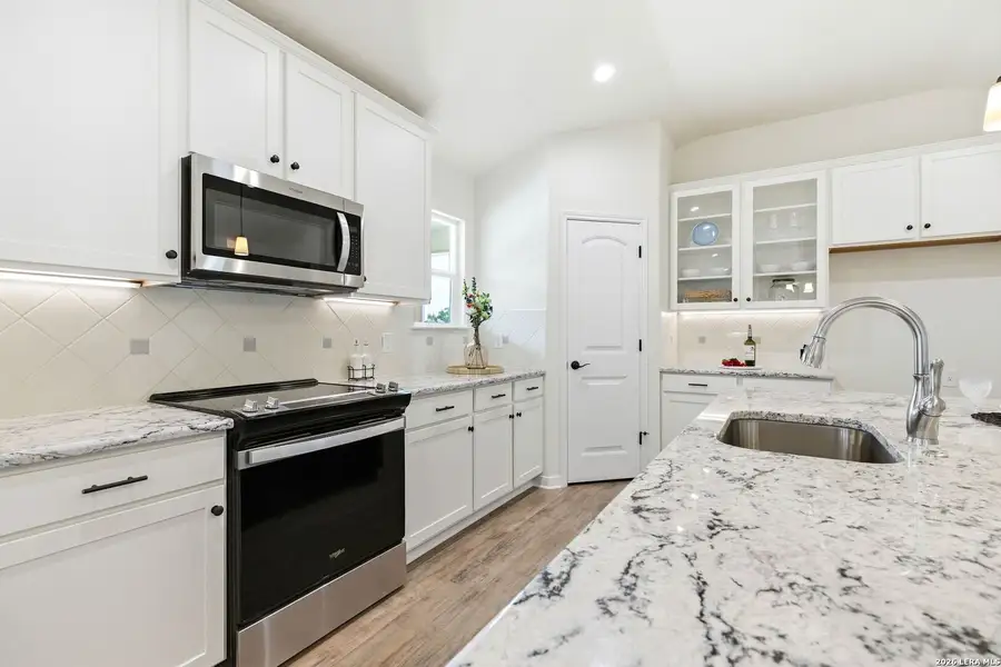 Furnished interior view inside a new home in , Fischer (Image 8).