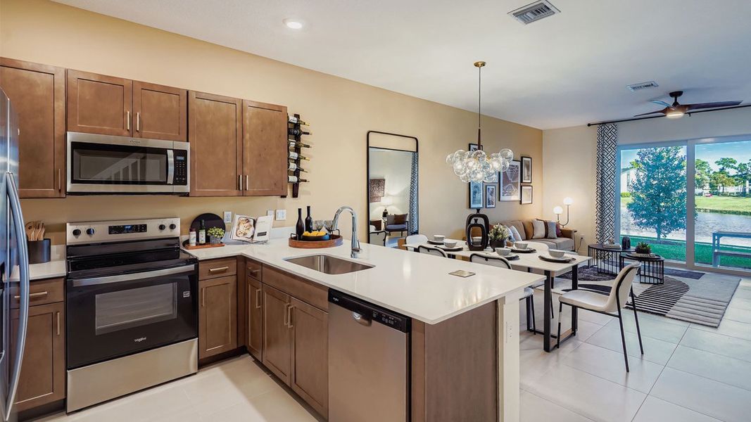 Representative furnished interior of a home built from the Waverly by D.R. Horton in Lakeside Landing, Royal Palm Beach (Image 10).
