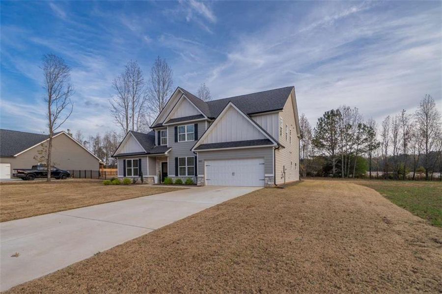 Front exterior of a new home in , Good Hope, GA, highlighting curb appeal (Image 30).