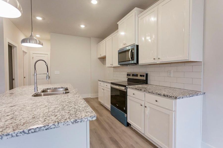 Furnished interior view inside a new home in , Buford (Image 12).