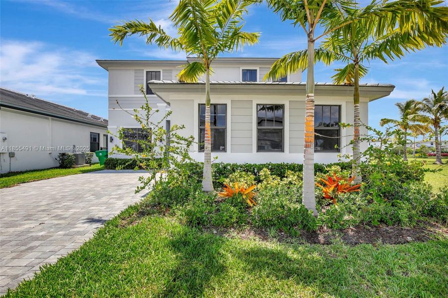 Front exterior of a new home in , Miramar, FL, highlighting curb appeal (Image 2).