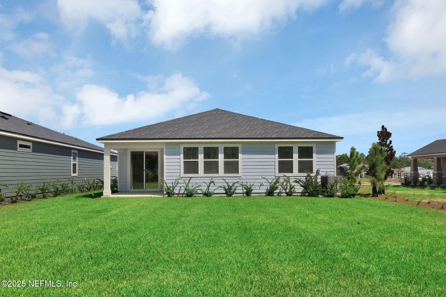 Front exterior of a new home in Hyland Trail, Green Cove Springs, FL, highlighting curb appeal (Image 14).