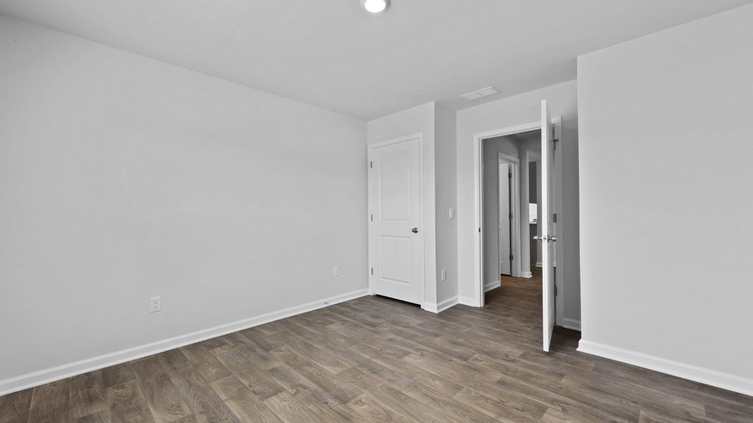 Representative unfurnished interior of a home built from the Cali by D.R. Horton in Center Pointe, Santee (Image 19).