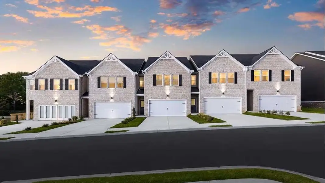 Front exterior of a new home in Parkway James, Snellville, GA, highlighting curb appeal (Image 1). Front exterior of a new home in Parkway James, Snellville, GA, highlighting curb appeal (Image 1).