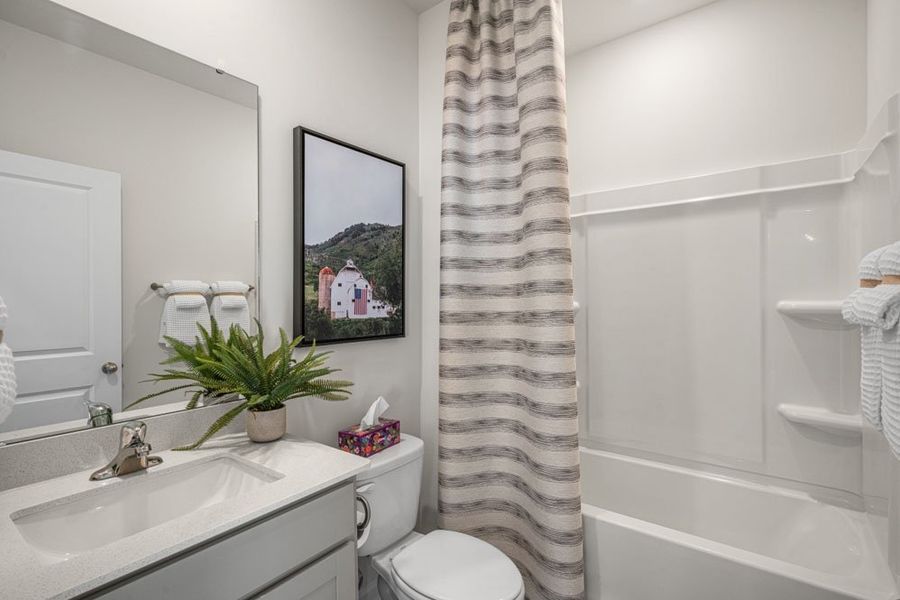 Representative furnished interior of a home built from the HAYDEN by D.R. Horton in Gretchen Pines, West End (Image 13).