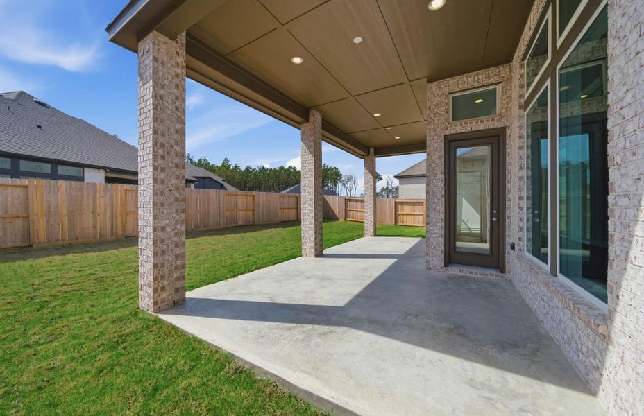 Exterior details and patio area of a home in The Highlands 55′, Porter (Image 3).