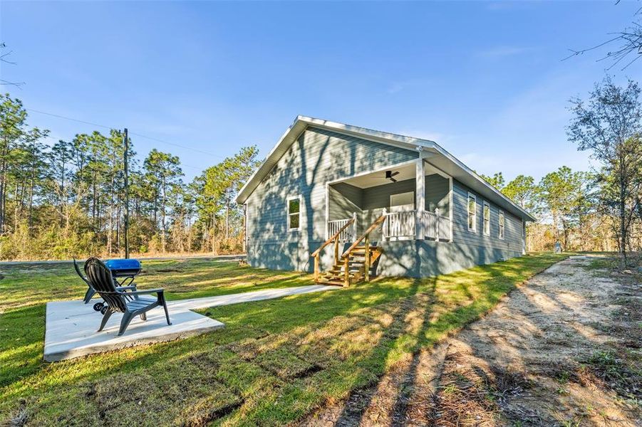 Exterior details and patio area of a home in , Williston (Image 19).