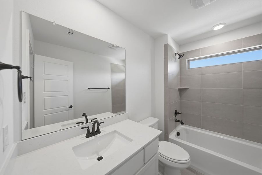 Furnished interior view inside a new home in Light Farms Brenham - 40' Lots, Celina (Image 13).