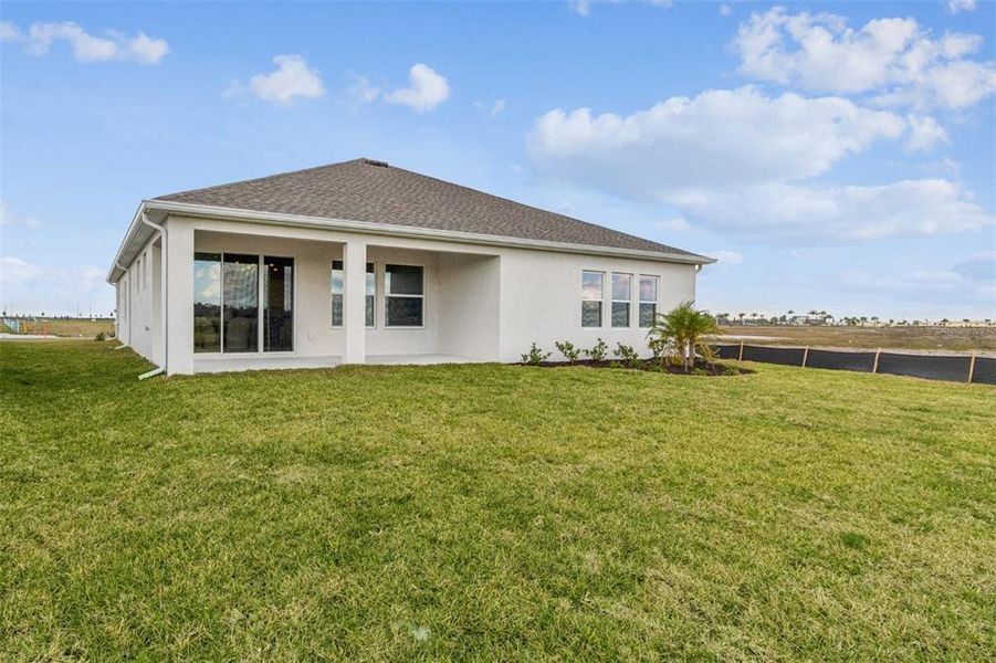 Exterior details and patio area of a home in Coasterra, Palmetto (Image 29).