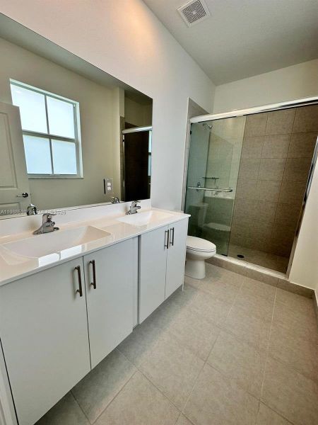 Furnished interior view inside a new home in , Coral Springs (Image 5). Furnished interior view inside a new home in , Coral Springs (Image 5).