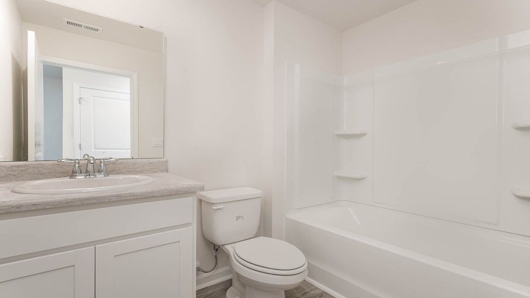 Representative furnished interior of a home built from the WYETH by D.R. Horton in Cottonwood Place, Tabor City (Image 7).