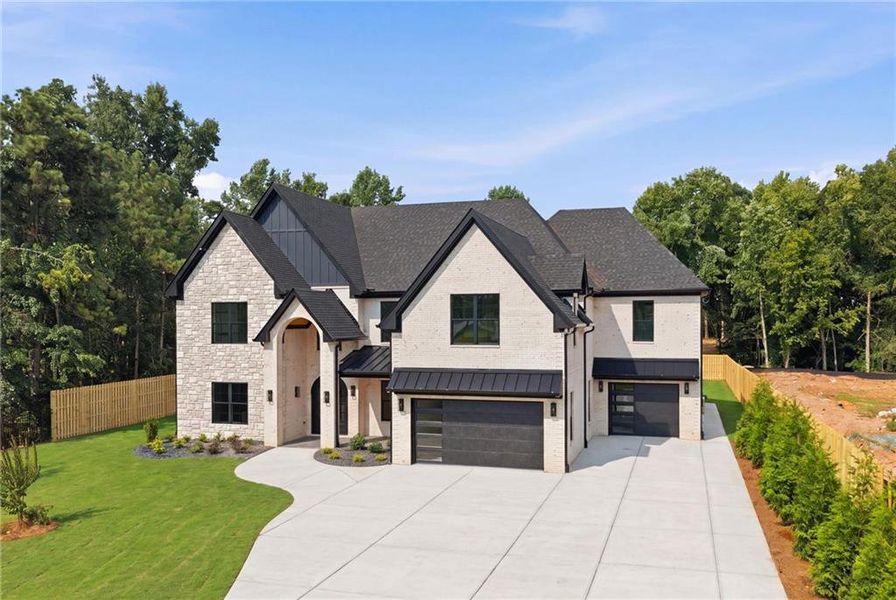 Front exterior of a new home in , Suwanee, GA, highlighting curb appeal (Image 26).