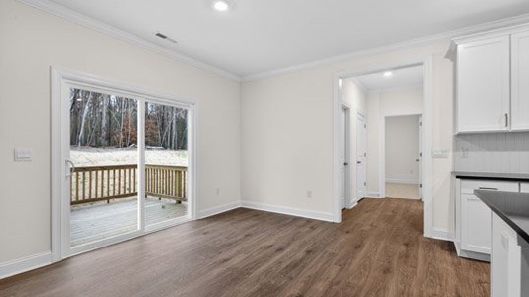 Representative unfurnished interior of a home built from the Tillery by D.R. Horton in The Estates Park, Apex (Image 21).