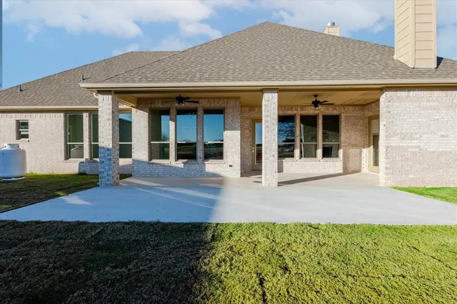 Exterior details and patio area of a home in , Poolville (Image 3). Exterior details and patio area of a home in , Poolville (Image 3).