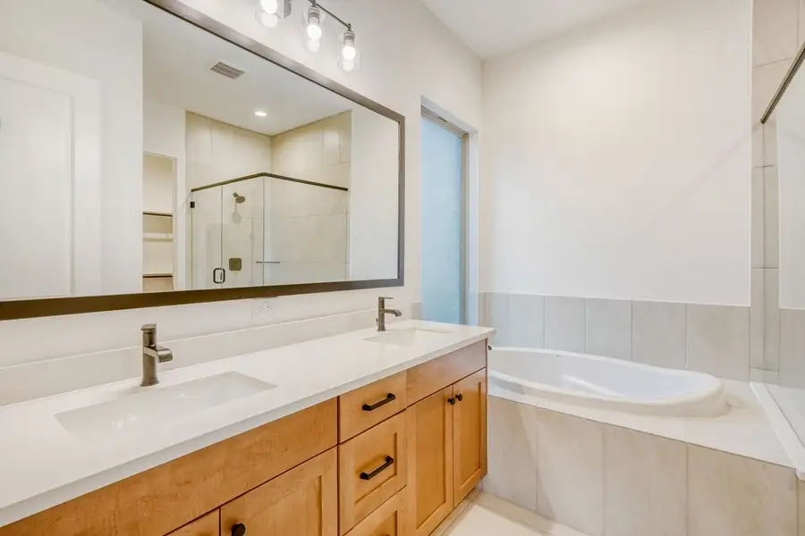 Furnished interior view inside a new home in 6 Creeks, Kyle (Image 5).