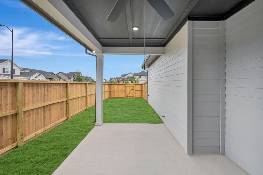 Exterior details and patio area of a home in Elyson - Grove Row Collection, Katy (Image 3).