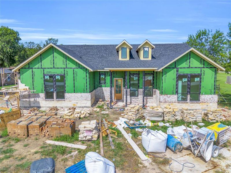Front of house with roof with shingles Front of house with roof with shingles