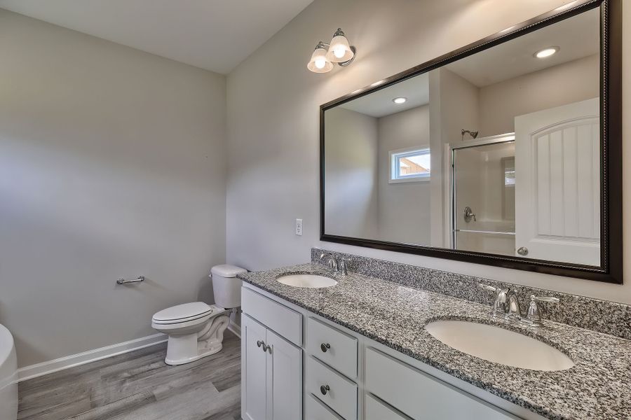 Representative furnished interior of a home built from the Sabel II by Great Southern Homes in Cottages at Roofs Pond, West Columbia (Image 12).