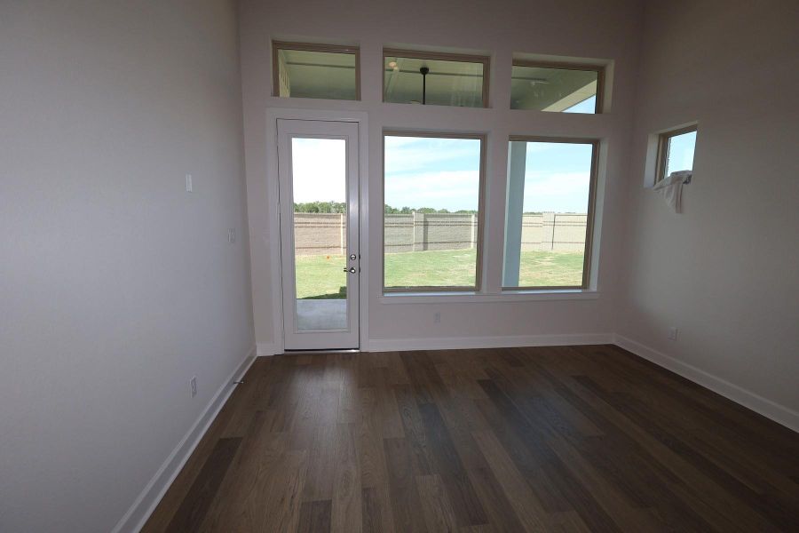Spacious, unfurnished interior of a new home in Prairieland Village - Grove Collection, Cypress (Image 19).
