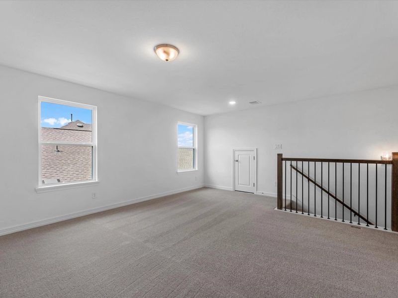 Upstairs loft. Sample product photo. Actual exterior and interior selections may vary by homesite. Photo may be virtually staged.