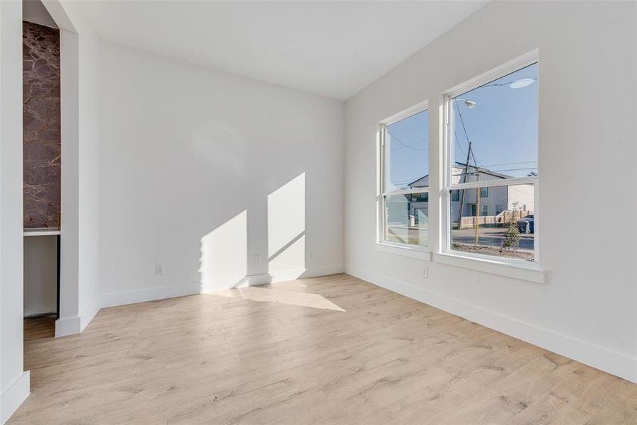 Spare room featuring light hardwood / wood-style floors