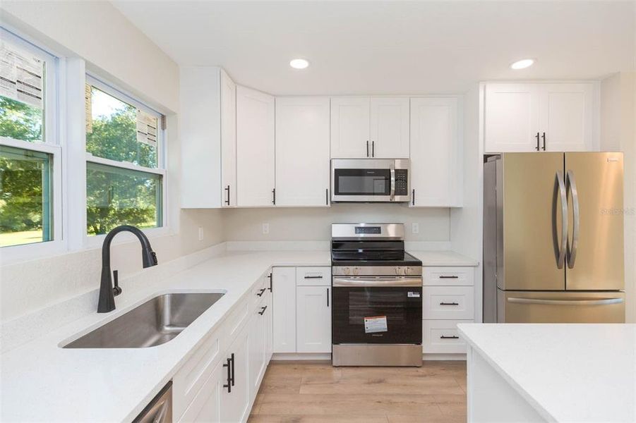 Furnished interior view inside a new home in , Dade City (Image 13).