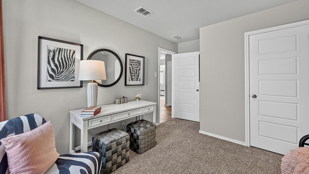 Representative furnished interior of a home built from the Austin by D.R. Horton in Sunnycreek, Crowley (Image 38).