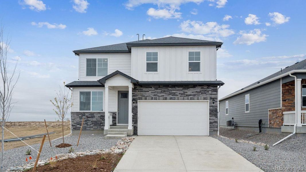 Front exterior of a new home in Timberleaf, Thornton, CO, highlighting curb appeal (Image 17).