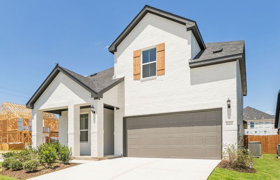 Front exterior of a new home in Kuempel Farms, Pflugerville, TX, highlighting curb appeal (Image 20).