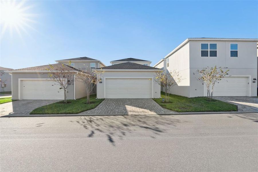 Front exterior of a new home in , Winter Garden, FL, highlighting curb appeal (Image 31).