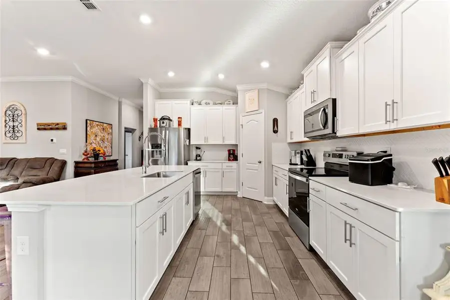 Furnished interior view inside a new home in Sawmill Branch, Palm Coast (Image 5).
