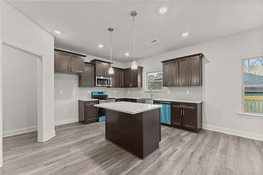 Furnished interior view inside a new home in Magnolia Villas, Cornelia (Image 7).