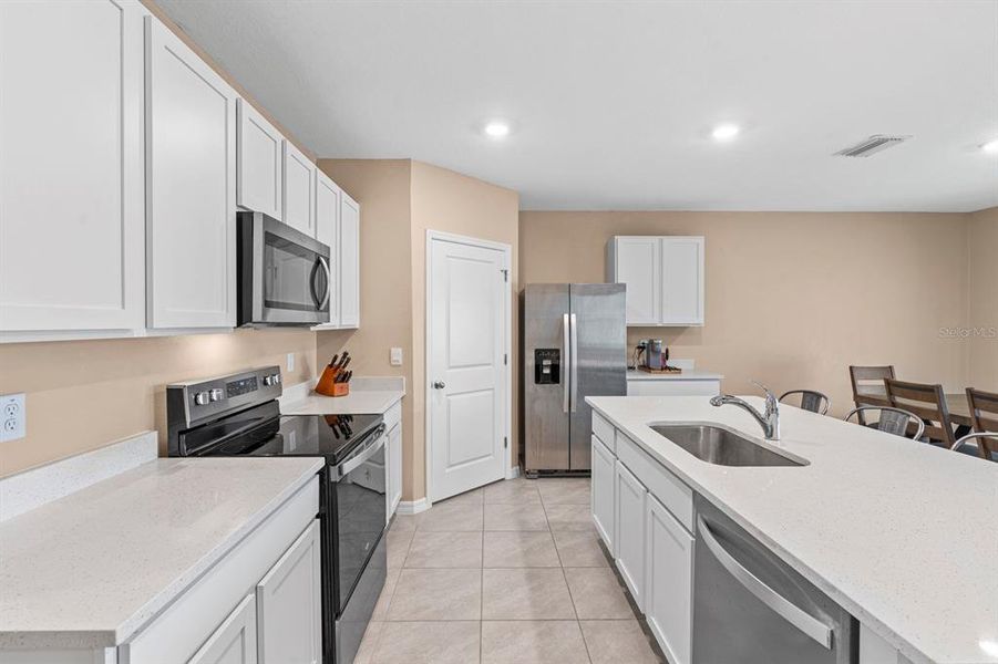 Furnished interior view inside a new home in Farm at Varrea, Plant City (Image 38). Furnished interior view inside a new home in Farm at Varrea, Plant City (Image 38).
