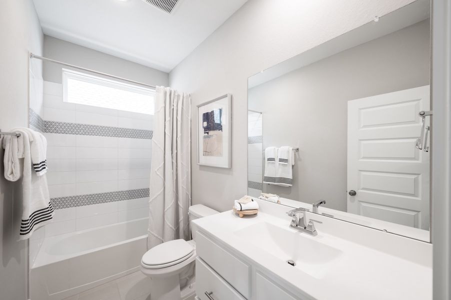 Representative furnished interior of a home built from the Verdin by Tri Pointe Homes in Pecan Ridge, Fulshear (Image 20).