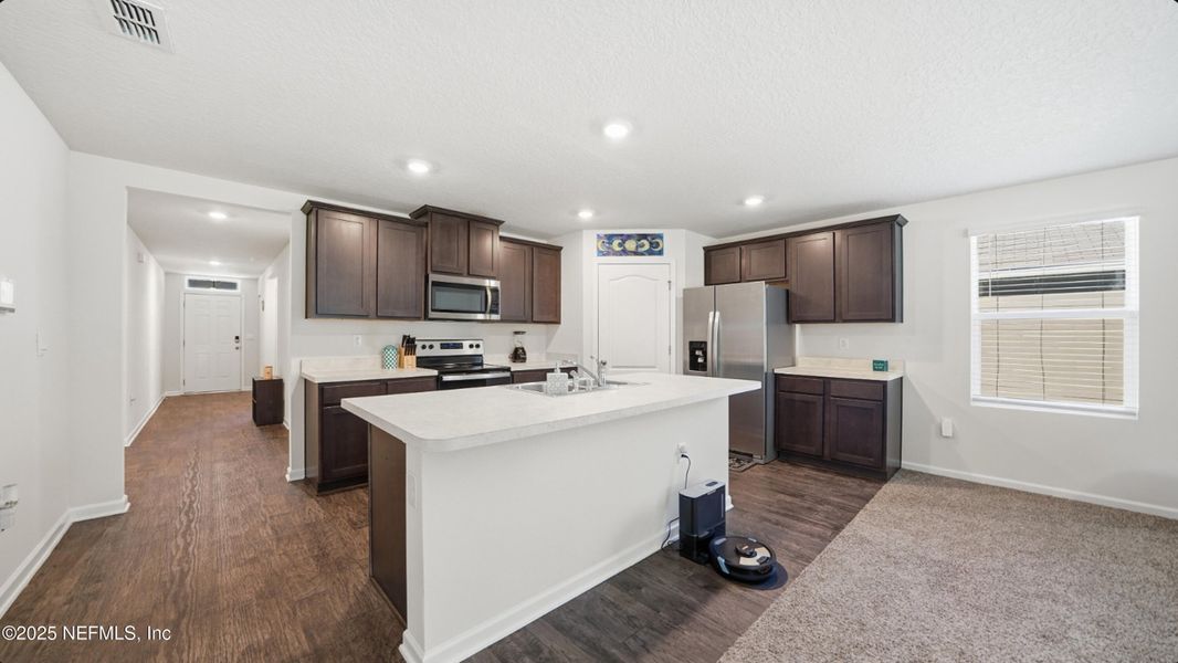 Furnished interior view inside a new home in River Glen Express, Yulee (Image 13).